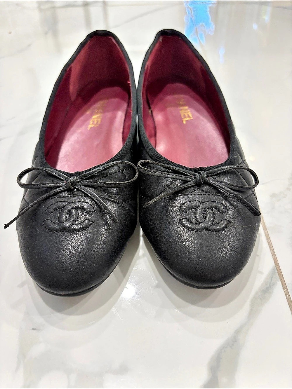 Quilted CC Logo Ballet Flats in Black